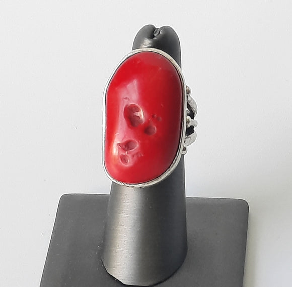 Lucky Brand Red coral stoned ring. Silverplate ring with three silverplate balls on each side of the stone. Adjustable band starts as a size 8 and can be sized down to smaller sizes. 