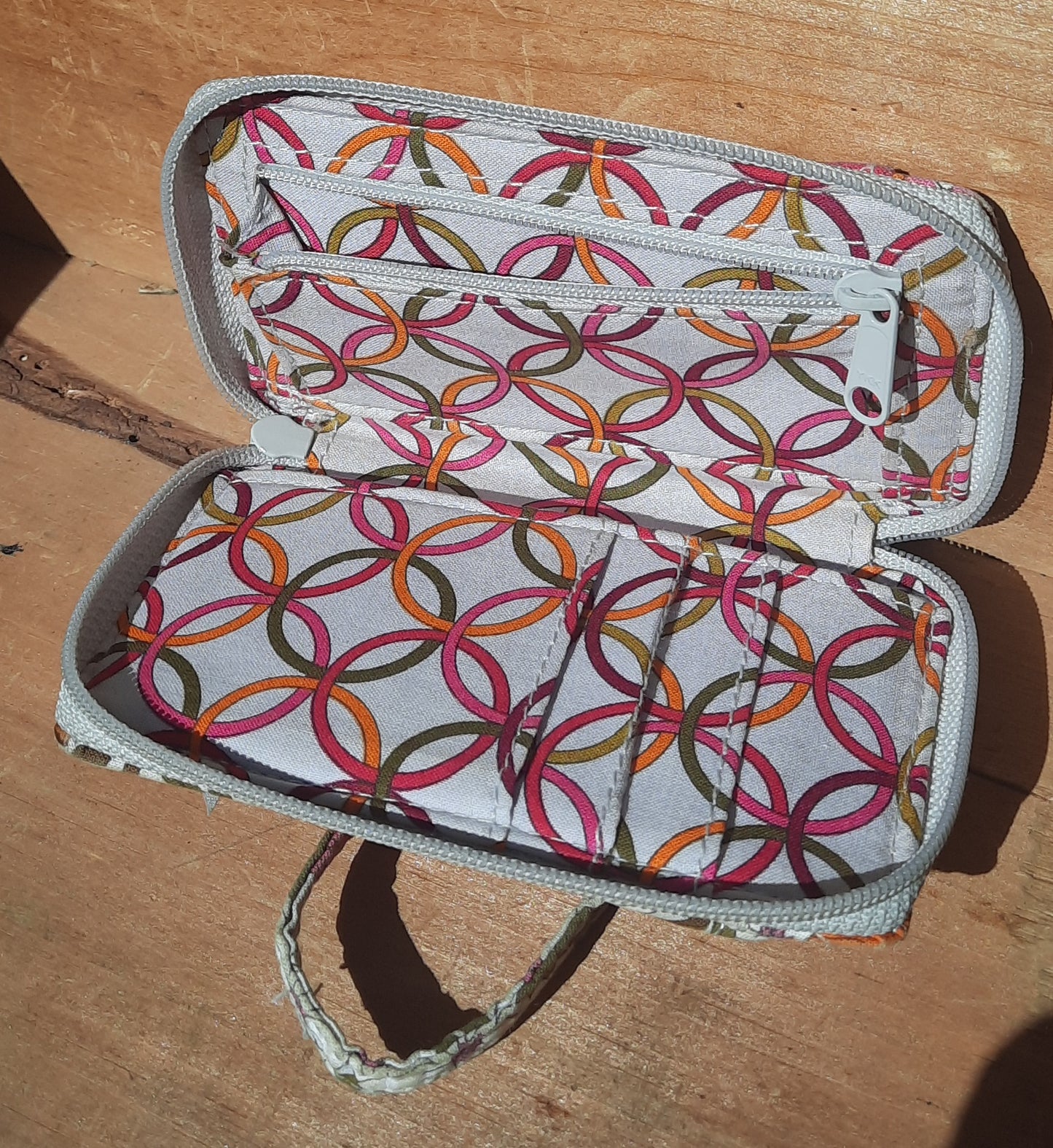 Pre Owned Vera Bradley Pink and Grey Tea Garden Wristlet. Pink Orange Yellow Flowers